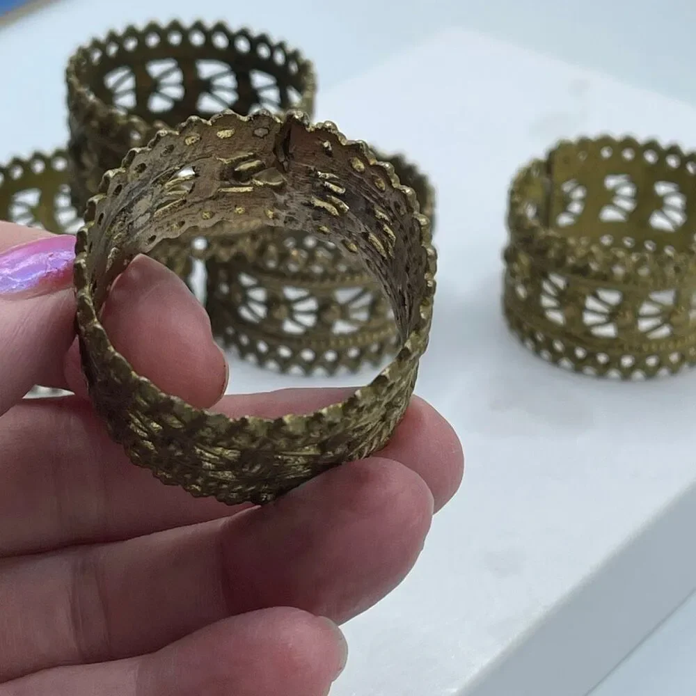 Set of 5 vintage ornate brass napkin ring holders.